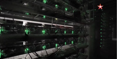 A large-scale mining farm bustling with active mining rigs generating cryptocurrency